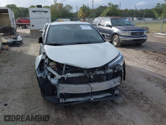 2018 Toyota C-HR XLE with VIN JTNKHMBX3J1010211, listed as a IAAI auction lot 40799443 with 104,148 mi miles. Bid and sale history available at carsss.com. Image 6.