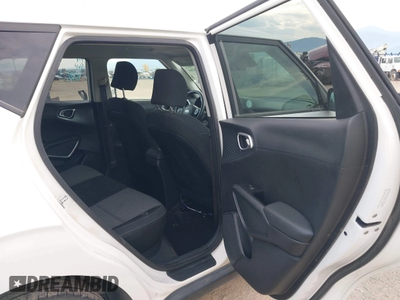 2020 Kia Soul LX with VIN KNDJ23AU0L7056999, listed as a IAAI auction lot 40407656 with 106,634 mi miles. Bid and sale history available at carsss.com. Image 8.