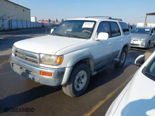 1997 Toyota 4Runner Limited with VIN JT3GN87RXV0028578, listed as a IAAI auction lot 41468199 with 305,731 mi miles. Bid and sale history available at carsss.com. Image 2.