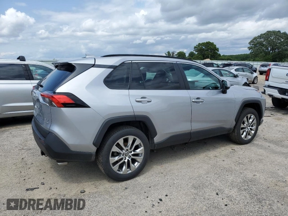 2021 Toyota RAV4 XLE Premium с VIN 2T3A1RFV3MC187245, выставлен на аукционе Copart как лот 60106205 с пробегом 104 373 миль миль и Списание • Salvage title. История ставок и продаж доступна на DreamBid. Изображение 3.
