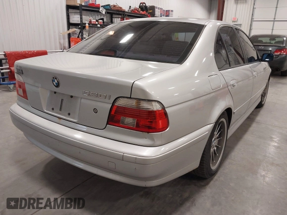 2001 BMW 5 Series 530iA with VIN WBADT63451CF02464, listed as a IAAI auction lot 41753041 with 297,760 mi miles. Bid and sale history available at carsss.com. Image 4.