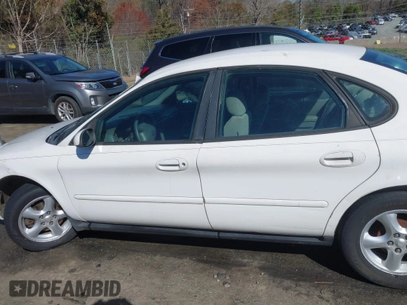 2003 Ford Taurus SE Standard with VIN 1FAFP53293G270314, listed as a IAAI auction lot 41840424 with 171,840 mi miles. Bid and sale history available at carsss.com. Image 13.