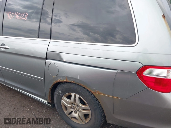 2005 Honda Odyssey EX-L with VIN 5FNRL38675B133498, listed as a IAAI auction lot 42046228 with 257,985 mi miles. Bid and sale history available at carsss.com. Image 6.
