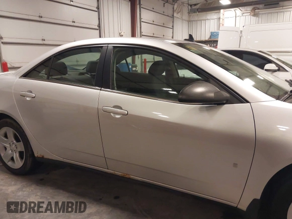 2009 Pontiac G6 w/1SA *Ltd Avail* with VIN 1G2ZG57B094155004, listed as a IAAI auction lot 41925584 with 123,169 mi miles. Bid and sale history available at carsss.com. Image 14.