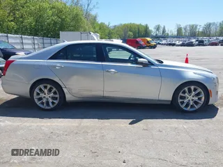 2014 Cadillac CTS Performance AWD z VIN 1G6AY5S38E0185345, wystawiony jako IAAI lot #42216924 z przebiegiem 141 654 mil mil oraz . Historia ofert i sprzedaży dostępna na DreamBid. Obrazek 13.
