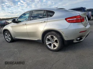 2010 BMW X6 xDrive35i z VIN 5UXFG4C51AL225532, wystawiony jako Copart lot #87133284 z przebiegiem 190 450 mil mil oraz Tytuł czysty. Historia ofert i sprzedaży dostępna na DreamBid. Obrazek 2.