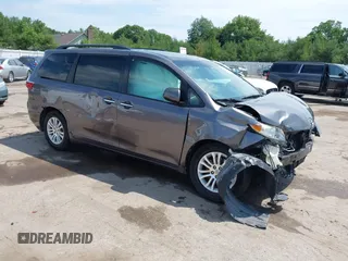 2015 Toyota Sienna XLE with VIN 5TDYK3DCXFS633128, listed as a IAAI auction lot 42527073 with 149,926 mi miles and . Bid and sale history available at DreamBid. Image 1.