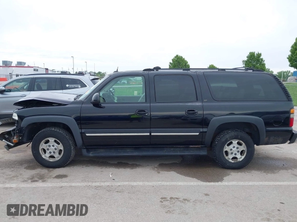 2004 Chevrolet Suburban LT z VIN 1GNFK16ZX4J291419, wystawiony jako IAAI lot #42163331 z przebiegiem 235 054 mil mil oraz . Historia ofert i sprzedaży dostępna na DreamBid. Obrazek 14.