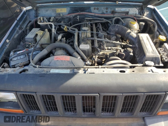1997 Jeep Cherokee SE with VIN 1J4FT28S3VL523807, listed as a Copart auction lot 46674525 with 144,635 mi miles and Clean title. Bid and sale history available at DreamBid. Image 12.