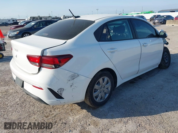 2023 Kia Rio LX with VIN 3KPA24AD9PE598789, listed as a IAAI auction lot 42019297 with 16,232 mi miles. Bid and sale history available at carsss.com. Image 4.