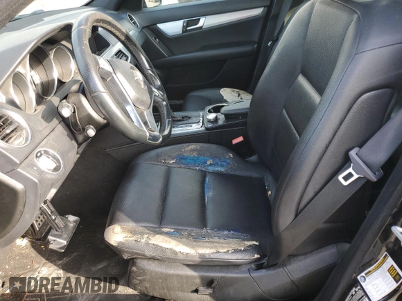 2014 Mercedes-Benz C 250 Sport with VIN WDDGF4HB8EA957803, listed as a Copart auction lot 63412805 with 110,391 mi miles and Clean title. Bid and sale history available at DreamBid. Image 7.