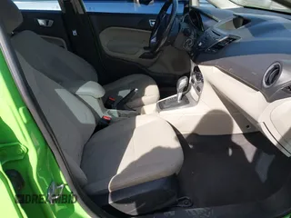 2014 Ford Fiesta SE with VIN 3FADP4BJ8EM226260, listed as a IAAI auction lot 41833140 with 188,917 mi miles and . Bid and sale history available at DreamBid. Image 5.