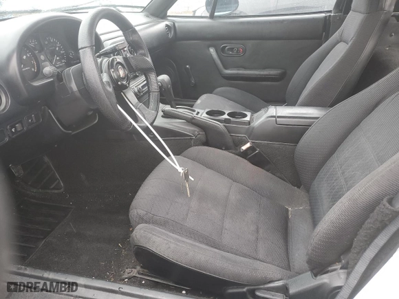 1991 Mazda MX-5 Miata Special Edition with VIN JM1NA351XM1240212, listed as a Copart auction lot 52531775 with 79,856 mi miles and Salvage Title. Bid and sale history available at carsss.com. Image 7.
