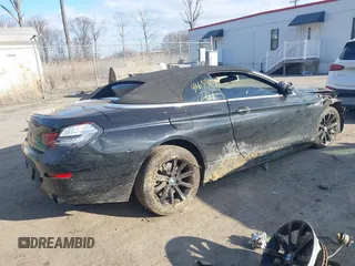 2015 BMW 6 Series 640i xDrive with VIN WBAYP5C55FD873292, listed as a IAAI auction lot 41633129 with 80,360 mi miles and . Bid and sale history available at carsss.com. Image 4.