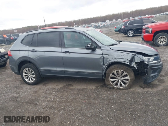 2019 Volkswagen Tiguan S with VIN 3VV0B7AX1KM046808, listed as a IAAI auction lot 41911225 with 62,972 mi miles and . Bid and sale history available at DreamBid. Image 13.