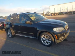 2011 BMW X5 35i with VIN 5UXZV4C54BL402935, listed as a IAAI auction lot 41198827 with 120,157 mi miles. Bid and sale history available at carsss.com. Image 1.