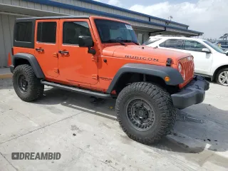 2015 Jeep Wrangler Unlimited Rubicon with VIN 1C4BJWFG9FL654550, listed as a Copart auction lot 49306965 with 64,911 mi miles and Salvage Title. Bid and sale history available at carsss.com. Image 4.
