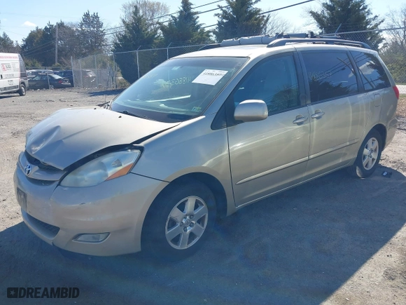 2010 Toyota Sienna XLE with VIN 5TDYK4CC0AS302669, listed as a IAAI auction lot 41886357 with 200,039 mi miles. Bid and sale history available at carsss.com. Image 17.