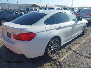 2016 BMW 4 Series 428i with VIN WBA4A9C56GGL88280, listed as a IAAI auction lot 41934868 with 166,720 mi miles and . Bid and sale history available at carsss.com. Image 4.