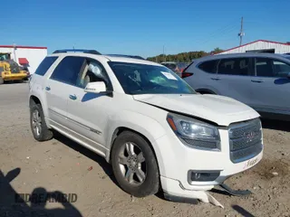 2013 GMC Acadia Denali with VIN 1GKKVTKD1DJ269656, listed as a IAAI auction lot 40638533 with 128,698 mi miles. Bid and sale history available at carsss.com. Image 1.