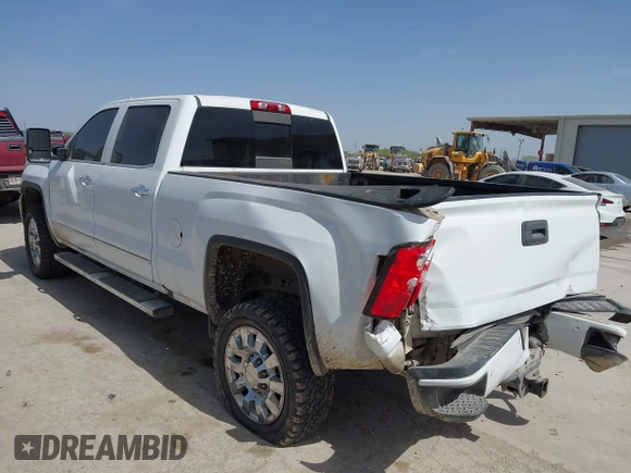 2017 GMC Sierra 2500HD Denali z VIN 1GT12UEY0HF111676, wystawiony jako IAAI lot #41834597 z przebiegiem 357 956 mil mil oraz . Historia ofert i sprzedaży dostępna na DreamBid. Obrazek 3.