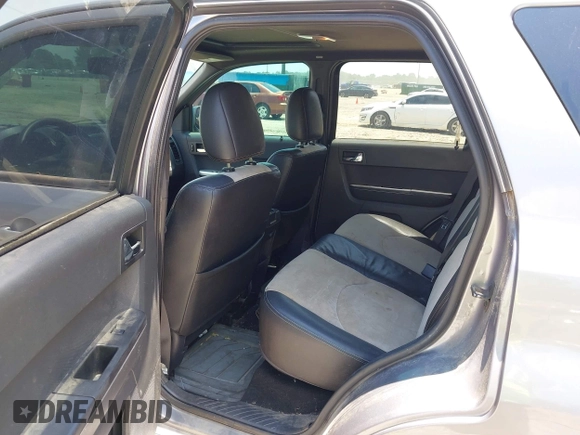 2008 Mercury Mariner Premier with VIN 4M2CU87118KJ08023, listed as a IAAI auction lot 42545623 with 161,639 mi miles and . Bid and sale history available at DreamBid. Image 8.