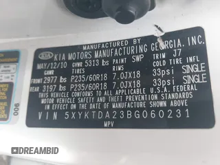 2011 Kia Sorento LX with VIN 5XYKTDA23BG060231, listed as a IAAI auction lot 42142538 with 166,884 mi miles. Bid and sale history available at carsss.com. Image 9.