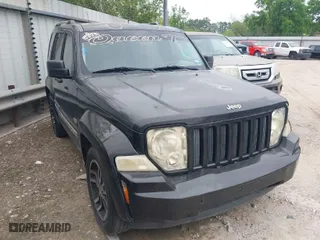 2011 Jeep Liberty Sport with VIN 1J4PP2GK0BW559054, listed as a IAAI auction lot 41642092 with 273,927 mi miles. Bid and sale history available at carsss.com. Image 1.