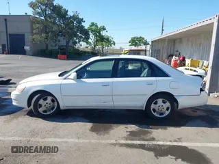 2004 Toyota Avalon XL z VIN 4T1BF28B54U362005, wystawiony jako IAAI lot #42174414 z przebiegiem 378 173 mil mil oraz . Historia ofert i sprzedaży dostępna na DreamBid. Obrazek 14.