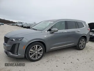 2022 Cadillac XT6 Premium Luxury with VIN 1GYKPDRS4NZ105282, listed as a Copart auction lot 87005544 with 71,225 mi miles and Salvage Title. Bid and sale history available at carsss.com. Image 1.