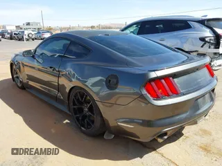 2015 Ford Mustang V6 with VIN 1FA6P8AM5F5318400, listed as a IAAI auction lot 41812625 with 97,728 mi miles and . Bid and sale history available at DreamBid. Image 3.