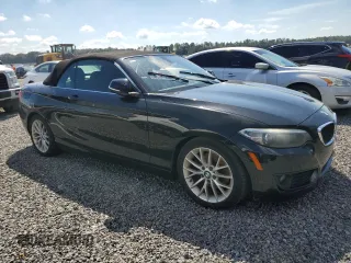 2015 BMW 2 Series 228i with VIN WBA1K5C52FV474012, listed as a Copart auction lot 73830094 with Not provided miles and Non repairable. Bid and sale history available at DreamBid. Image 4.