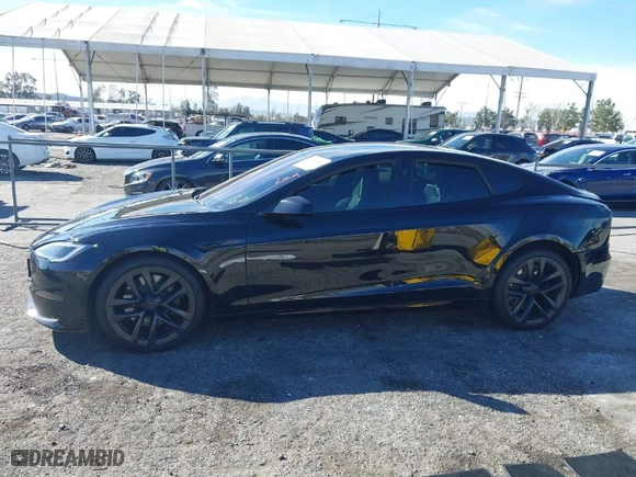 2022 Tesla Model S with VIN 5YJSA1E52NF488134, listed as a IAAI auction lot 41681556 with 1 mi miles. Bid and sale history available at carsss.com. Image 14.