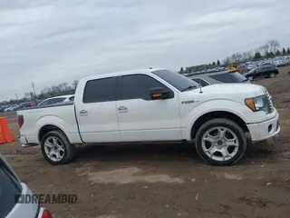 2011 Ford F-150 Lariat with VIN 1FTFW1E60BFA47055, listed as a IAAI auction lot 41693226 with 170,594 mi miles. Bid and sale history available at carsss.com. Image 14.