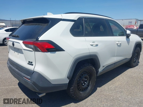 2022 Toyota RAV4 Hybrid XLE Premium z VIN 4T3B6RFVXNU079761, wystawiony jako IAAI lot #42395817 z przebiegiem 73 830 mil mil oraz . Historia ofert i sprzedaży dostępna na DreamBid. Obrazek 4.