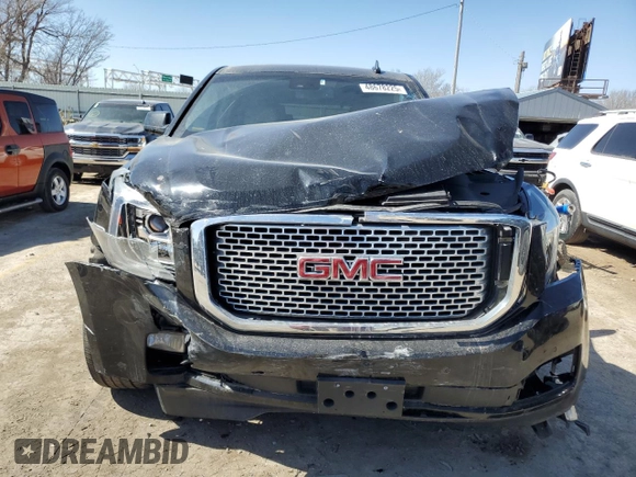 2017 GMC Yukon Denali with VIN 1GKS2CKJXHR389946, listed as a Copart auction lot 48678225 with 156,603 mi miles and Salvage Title. Bid and sale history available at carsss.com. Image 5.