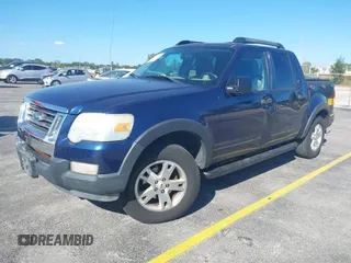 2007 Ford Explorer Sport Trac XLT z VIN 1FMEU31K57UA25387, wystawiony jako IAAI lot #41839716 z przebiegiem 199 004 mil mil oraz . Historia ofert i sprzedaży dostępna na DreamBid. Obrazek 2.