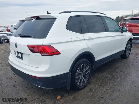 2021 Volkswagen Tiguan S with VIN 3VV1B7AX5MM045667, listed as a IAAI auction lot 41256945 with 90,523 mi miles. Bid and sale history available at carsss.com. Image 4.