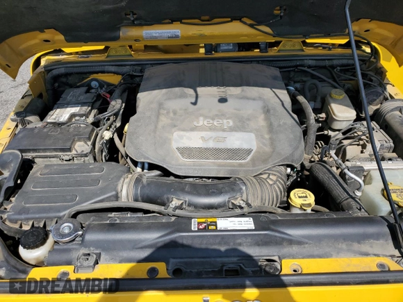 2015 Jeep Wrangler Rubicon Hard Rock with VIN 1C4BJWCG6FL568665, listed as a Copart auction lot 60282155 with 107,773 mi miles and Salvage title. Bid and sale history available at DreamBid. Image 11.