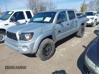 2006 Toyota Tacoma z VIN 5TELU42N56Z232703, wystawiony jako IAAI lot #41689447 z przebiegiem 171 801 mil mil oraz . Historia ofert i sprzedaży dostępna na DreamBid. Obrazek 2.
