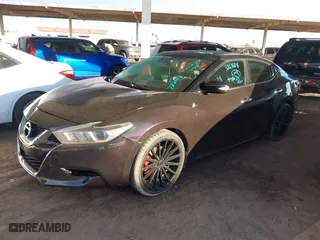 2016 Nissan Maxima 3.5 SL with VIN 1N4AA6AP5GC382668, listed as a IAAI auction lot 41451440 with 163,884 mi miles. Bid and sale history available at carsss.com. Image 16.