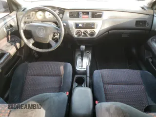 2005 Mitsubishi Lancer with VIN JA3AJ66F25U016375, listed as a Copart auction lot 73584514 with 202,752 mi miles and Clean Title. Bid and sale history available at DreamBid. Image 8.