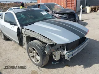 2012 Ford Mustang Premium with VIN 1ZVBP8AM5C5234532, listed as a IAAI auction lot 41860791 with 106,929 mi miles and . Bid and sale history available at DreamBid. Image 6.