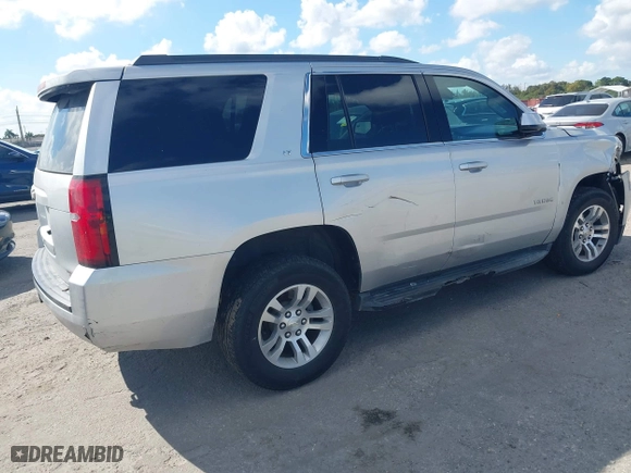 2017 Chevrolet Tahoe LT with VIN 1GNSCBKC6HR233401, listed as a IAAI auction lot 41544529 with 107,796 mi miles. Bid and sale history available at carsss.com. Image 4.