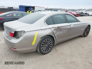 2012 BMW 7 Series 740i with VIN WBAKA4C51CC613670, listed as a IAAI auction lot 41582639 with 149,753 mi miles. Bid and sale history available at carsss.com. Image 4.