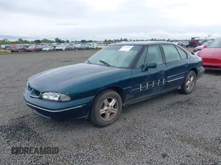 1998 Pontiac Bonneville SE with VIN 1G2HX52K0W4211117, listed as a IAAI auction lot 42125471 with 187,249 mi miles. Bid and sale history available at carsss.com. Image 2.