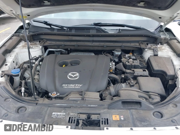 2019 Mazda CX-5 Sport with VIN JM3KFABM4K1565787, listed as a IAAI auction lot 42054585 with 80,580 mi miles and . Bid and sale history available at DreamBid. Image 10.