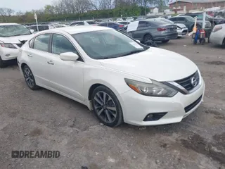 2017 Nissan Altima SR with VIN 1N4AL3APXHC152604, listed as a IAAI auction lot 41978787 with 104,268 mi miles and . Bid and sale history available at DreamBid. Image 1.