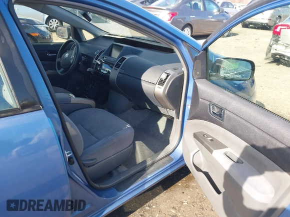 2006 Toyota Prius with VIN JTDKB20U167073069, listed as a IAAI auction lot 41886556 with 122,945 mi miles. Bid and sale history available at carsss.com. Image 5.
