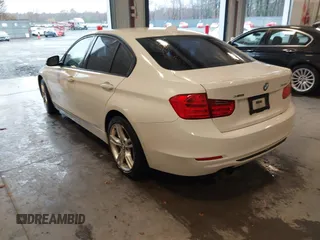 2014 BMW 3 Series 328i xDrive with VIN WBA3B5C53EP543964, listed as a IAAI auction lot 41856923 with 149,440 mi miles. Bid and sale history available at carsss.com. Image 3.